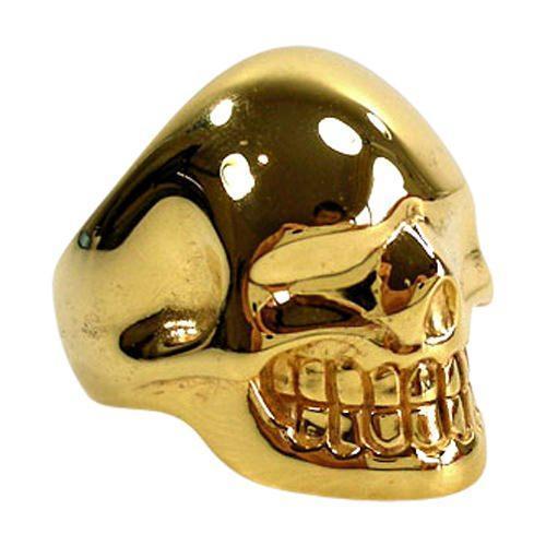 Металлическое золотое кольцо с черепом